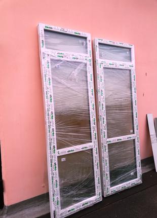 Новые металлопластиковые балконные двери от производителя. 70 мм.