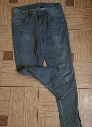 Сірі джинси з замочками внизу р. м/l