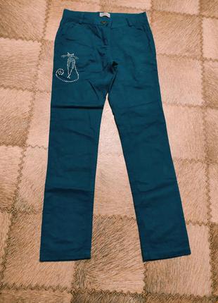 Котоновые джинсы с камешками кися р 140-146 10-12лет бирюзовог...