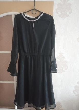 Черное платье bpc с длинными рукавами