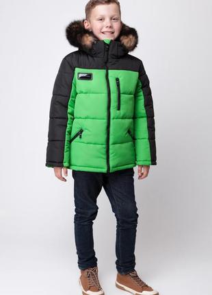 Новая теплая и качественная зимняя куртка для мальчика . 140 р...