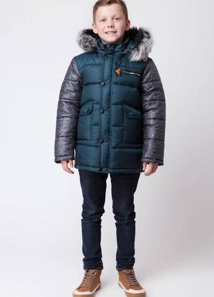 Новая стильная и теплая зимняя куртка для мальчика 122 р. пр-в...
