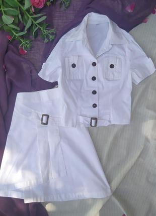 Белоснежный котоновый костюм с ассиметричной юбочкой