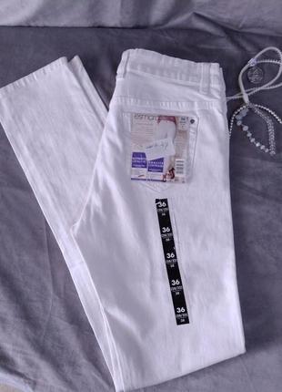 Білі джинсові штани, європейські розміри одягу 36,40