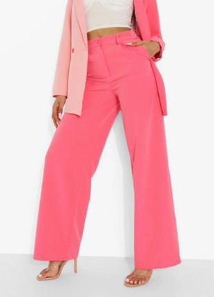 Широкі приталені штани рожевого кольору