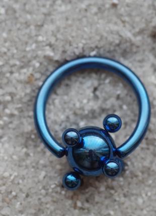 Кольцо 15 мм из титана с шариком . Молекула синяя