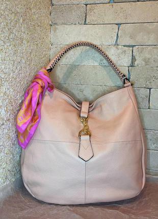 Шкіряна сумка,ніжно рожева,з золотою фурнітурою, пензлики.італія.
