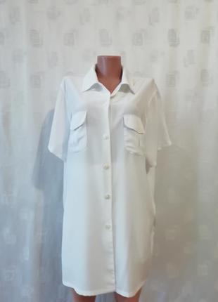 Елегантна біла сорочка з коротким рукавом