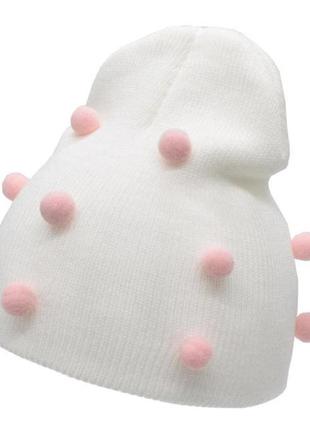 Детская шапка для новорожденных белая с розовыми пампонами раз...