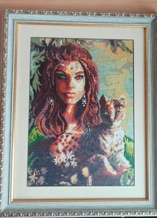 Картина "девушка с леопардом" , вышитая крестиком