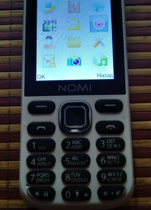 Мобильный телефон Nomi i244. Рабочий, в хорошем состоянии.