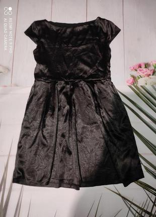 Фактурное черное платье для школы 7-9 лет