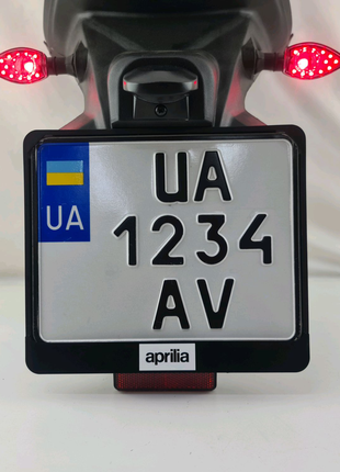 Aprilia рамка для мото номера Украины