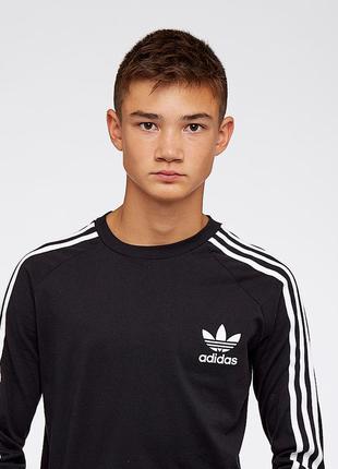 Реглан футболка с длинными рукавами и тремя полосками adidas о...