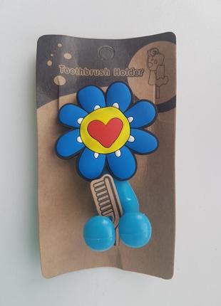 Утримувач для зубних щіток з синім квіточкою
