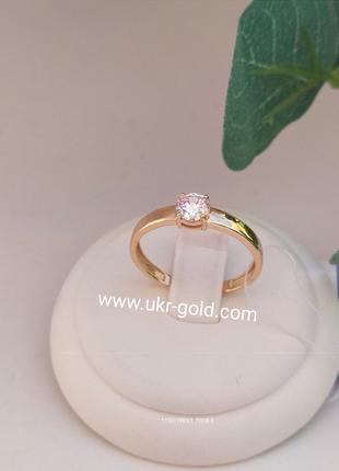 Золотое кольцо с цирконием Золотое помолвочное кольцо с фианит...