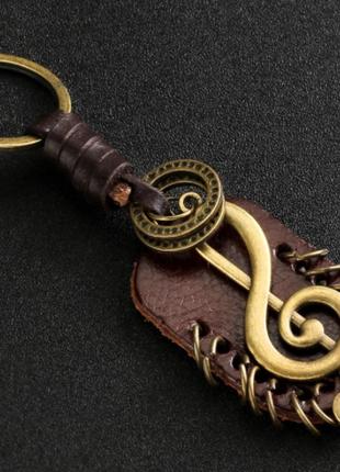 Брелок металл цвет бронза подарок музыканту скрипичный ключ ка...
