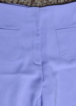 Нежно-фиолетовые брюки