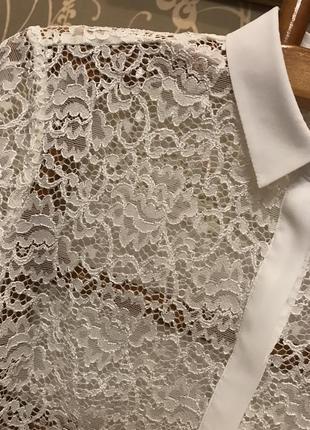 Очень красивая и стильная брендовая кружевная блузка белого цв...