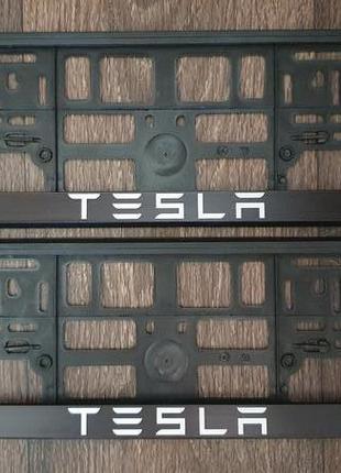 Рамка под номер Tesla. Эксклюзивные номерные рамки Тесла.