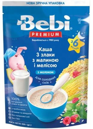 Детская каша Bebi Premium молочная 3 злака с малиной и мелиссо...