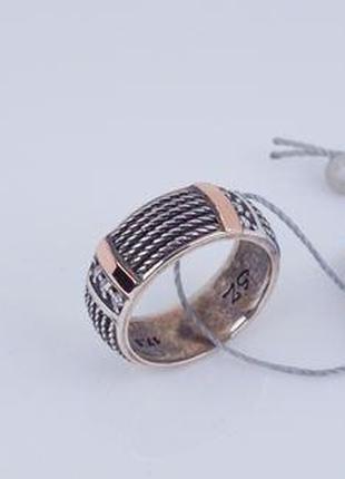 Серебряное кольцо с фианитами и золотыми напайками 925/375 пробы.