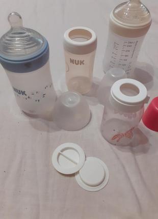 Бутылочки для кормления nuk.пластик