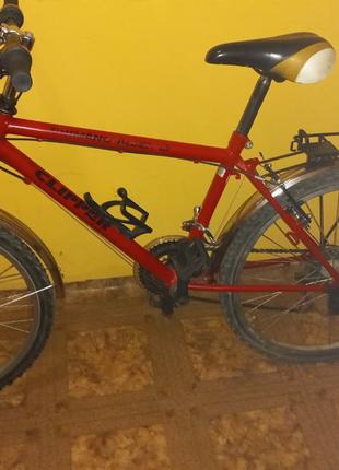 Велосипед спортивний червоного кольору. 18 передач. Майже новий !