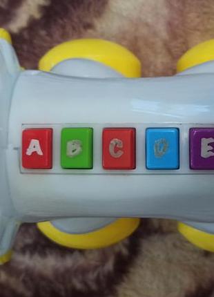 Интерактивная игрушка английский язык динозавр алфавит батарей...