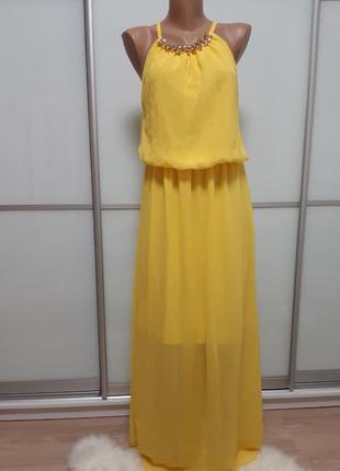 Жовте яскраве довге плаття