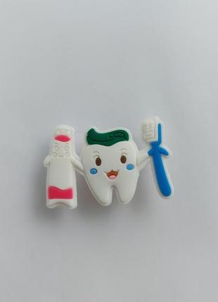 Зуб, зубная паста джибитс