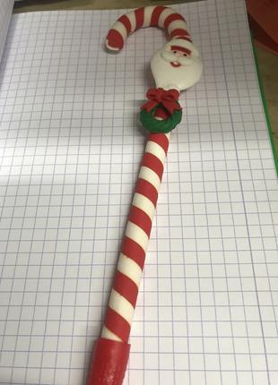 Ручка новорічна у формі карамельної тростини Дід Мороз