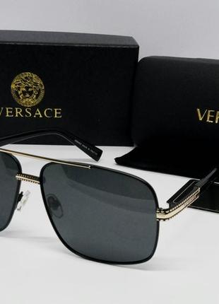 Versace стильные мужские солнцезащитные очки черные с золотом