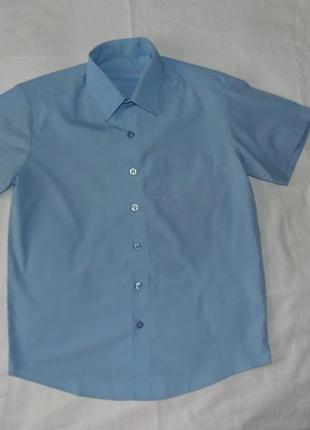 Голубая рубашка,рукав короткий на 10-11 лет