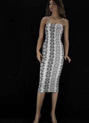 Облегаюшее сукня "femme luxe" зі зміїним принтом. розмір uk8.