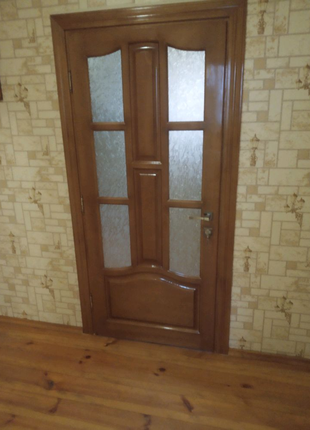 Дерев'яні двері з масива