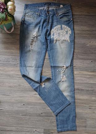 Женские голубые джинсы с дырками и потертостями philipp plein р.м