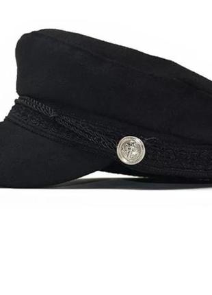 Жіноча кепка (кепі) з козирком чорного кольору.