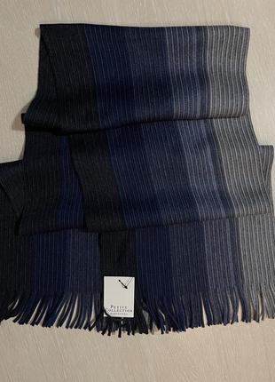Очень красивый и стильный брендовый вязаный шарф в полоску.