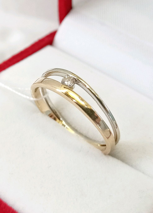 Золотое кольцо с бриллиантом комбинированное