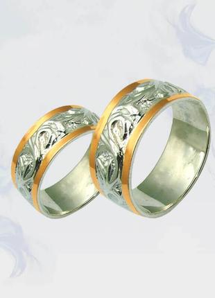 Обручальные кольца из серебра с золотыми вставками
