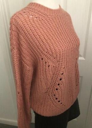 Рожевий в'язаний джемпер светр масивної в'язки з високим комір...