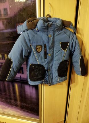 Куртка на мальчика синего цвета
