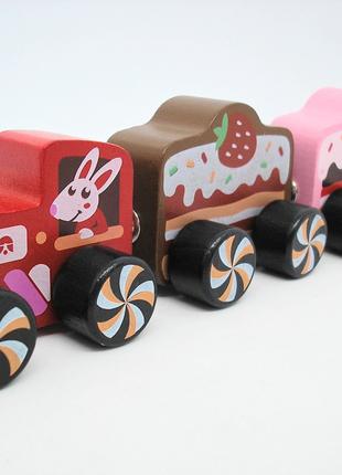 Іграшка дерев'яна дитяча поїзд на магнітах різнокольоровий роз...