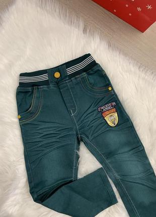Стильні якісні джинси темно зелені