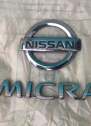 Емблема значок на кришку багажника Nissan Micra K12