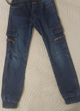 Теплые джинсы на мальчика 9-10 лет