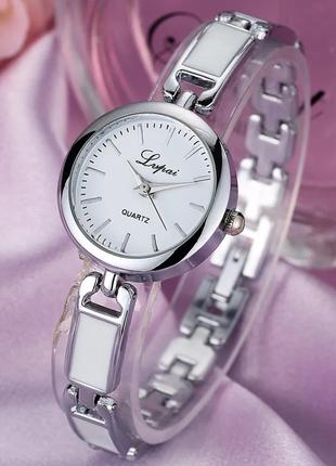 Женские кварцевые часы- браслет