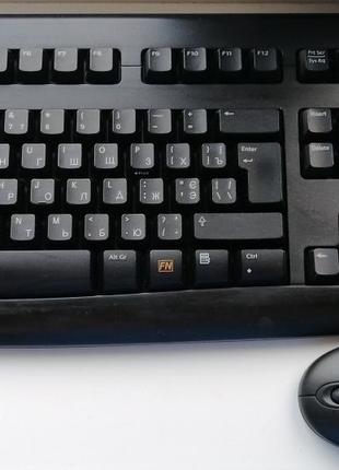 Клавиатура, мышь и адаптер черные. logitech deluxe 660 cordles...