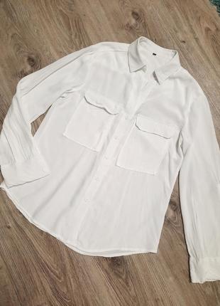 Біла блузка